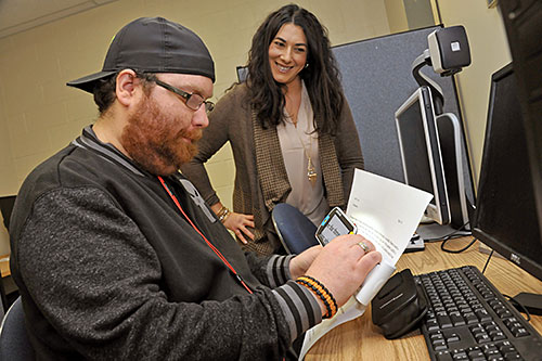 Student and instructor using magnifier