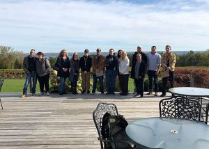 Students at the Buttonwood Grove Winery gathered together in a group photo